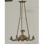 A large 19th Century three branch ormolu Ceiling Light, decorated with rams heads, grotesque masks,