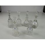An unusual suite of three Victorian glass Decanters, a pair, and one smaller matching ditto,