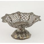 An attractive early Victorian pierced English silver Tazza, the rim with embossed flower heads,