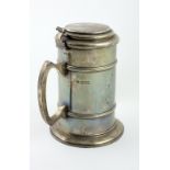 A plain early 20th Century English silver lidded Tankard, by J. Wahely & F.C. Wheeler, London c.