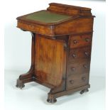 A Victorian period inlaid walnut Davenport Desk, with lift up stationery container, and slope top