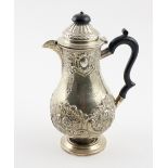 An attractive small embossed English silver Coffee Pot, London 1896,