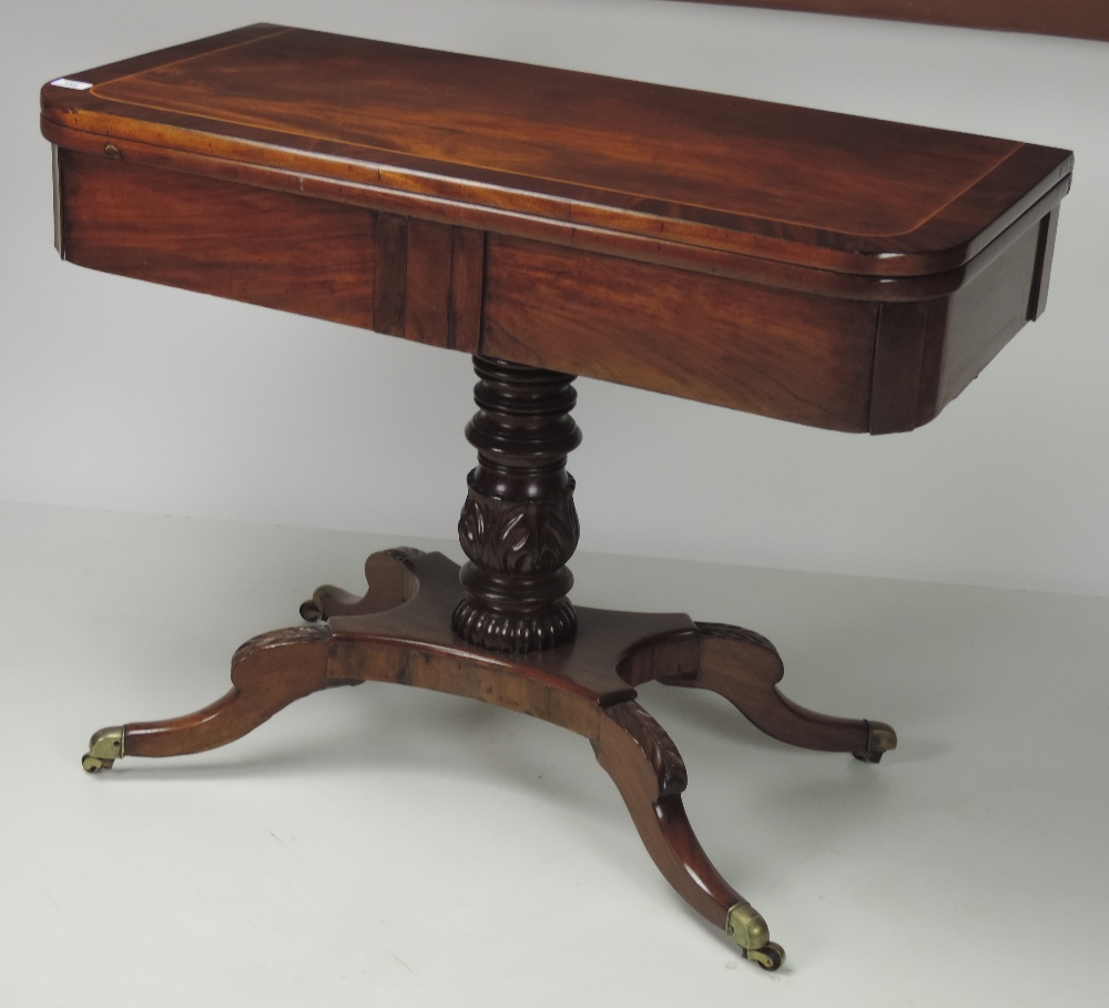 An attractive George III period figured mahogany fold-over Card Table,