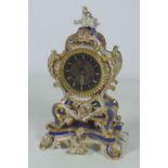 An attractive 19th Century Continental porcelain Mantle Clock, blue ground and floral decoration,