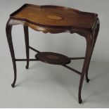 An unusual Edwardian inlaid mahogany Occasional Table, the top with large shell inlaid panel,