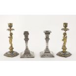 A pair of embossed English silver Bachelor Candlesticks, c.