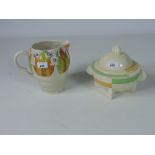 A Clarice Cliff Vegetable Dish & Cover, Bizarre design, and an attractive Water Jug,