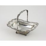 A heavy English silver Fruit Basket, with decorated swing handle,