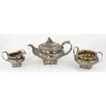 A very good George IV embossed English silver three piece Tea Service,
