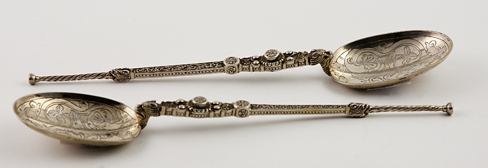 An unusual pair of English Serving Spoons,