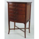 A good quality bow fronted mahogany Music Cabinet, with five drop front drawers.