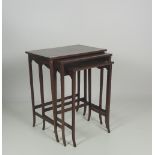 A nest of three matching Edwardian inlaid mahogany Occasional Tables ,