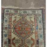 A very fine large cream ground Oriental Runner,