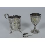 A heavy two handled late 18th Century Irish silver Cup, with embossed decoration flowers,