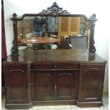 A fine quality Victorian carved mirror back Sideboard, the carved back over a moulded inverted top,