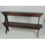 A pair of late 19th Century mahogany Benches, with solid shaped legs and later aprons,