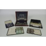 A cased set of 12 silver Fruit Knives & Forks;