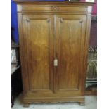 An attractive 19th Century oak Armoire, with moulded cornice,