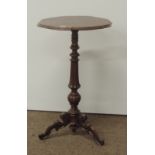 An attractive Victorian carved walnut Occasional Table, with shaped top, on tripod base,