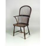 A very good early 19th Century high back elm Windsor Armchair, with saddle seat.