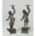 A very good pair of small 19th Century painted Blackamoor Table Figures,