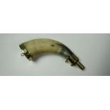 A good quality brass and horn Powder Flask, c. 1840, 20cms, (8") long.