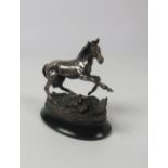 Geoffrey Snell A fine heavy silver Model of a Horse, "The Startled Yearling," by Geoffrey Snell,