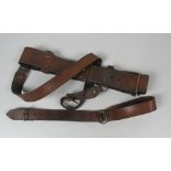 A good quality brass mounted leather Sam Brown Belt.