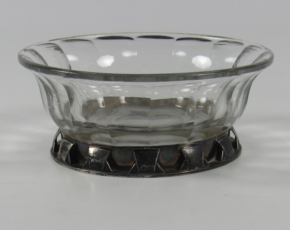 A fine heavy Baccarat cut glass Bowl, with unusual French silver mounted base.