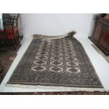 A good quality cream ground Iranian Carpet, with elaborately decorated centre and multiple borders,