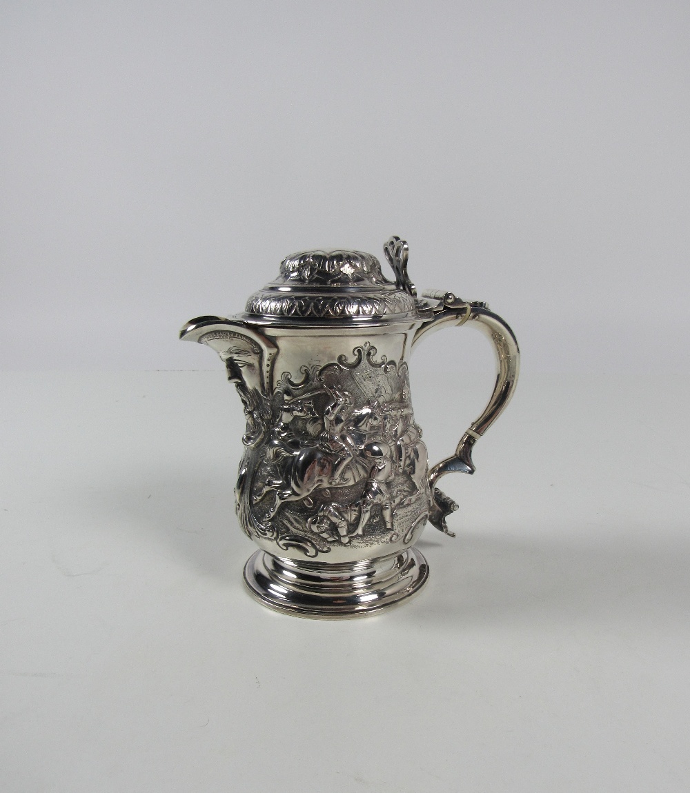 A very good 18th Century large embossed Beer Tankard with hinged lid, by Charles Wright, London, c.