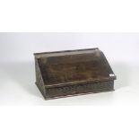 A late 18th Century / early 19th Century carved oak Bible Box, with slope top, 61cms (24") wide.