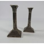 A good pair of Corinthian style silver Candlesticks, London c.