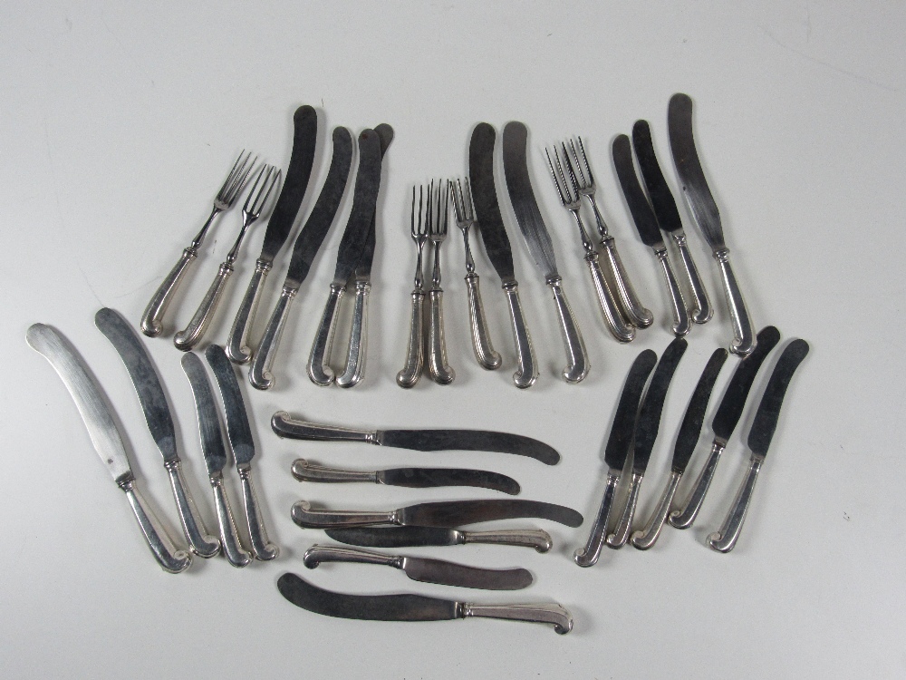 A very rare suite of English Georgian silver pistol handled Cutlery,