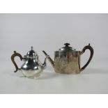 An English Georgian silver Teapot, of oval form, with engraved decoration and coat of arms,