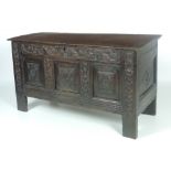 A late 18th Century Scottish? carved oak Coffer, with carved panel sides,