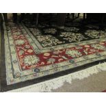 A good quality small Oriental red ground Carpet, with multiple medallion designs with narrow border,