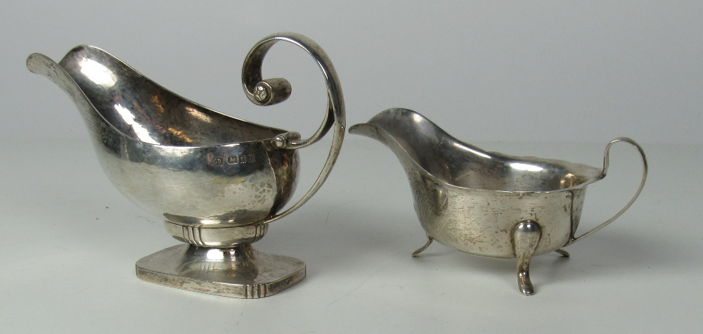 An unusual shaped heavy silver Sauceboat, London 1927, and another Sheffield c.