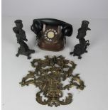 A pair of 19th Century bronze Candlesticks, modelled as satyrs seated on tortoises,