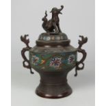 A Chinese champleve Incense Burner, the lid surmounted with Dog of Fu, and with two dragon handles,
