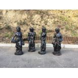 A set of four heavy cast iron Statues, modelled as the "Four Seasons," each approx.