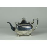 An Irish George III silver Teapot, with reeded body, Dublin c. 1809, by James Scott, approx.
