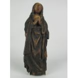 An early 16th Century Spanish carved polychrome "Figure of the Madonna," 35.5cms (14") high.