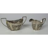 A Birmingham silver Sugar Bowl & Cream Jug, with embossed bodies, c.