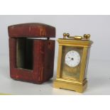 A rare heavy brass Miniature Carriage Clock, the small enamel dial signed Henry Capt.
