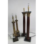 A pair of heavy black marble and brass Corinthian style Table Lamps; a pair of larger similar ditto,