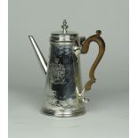 An extremely fine George II straight sided Coffee Pot, with flat chasing and straight spout,