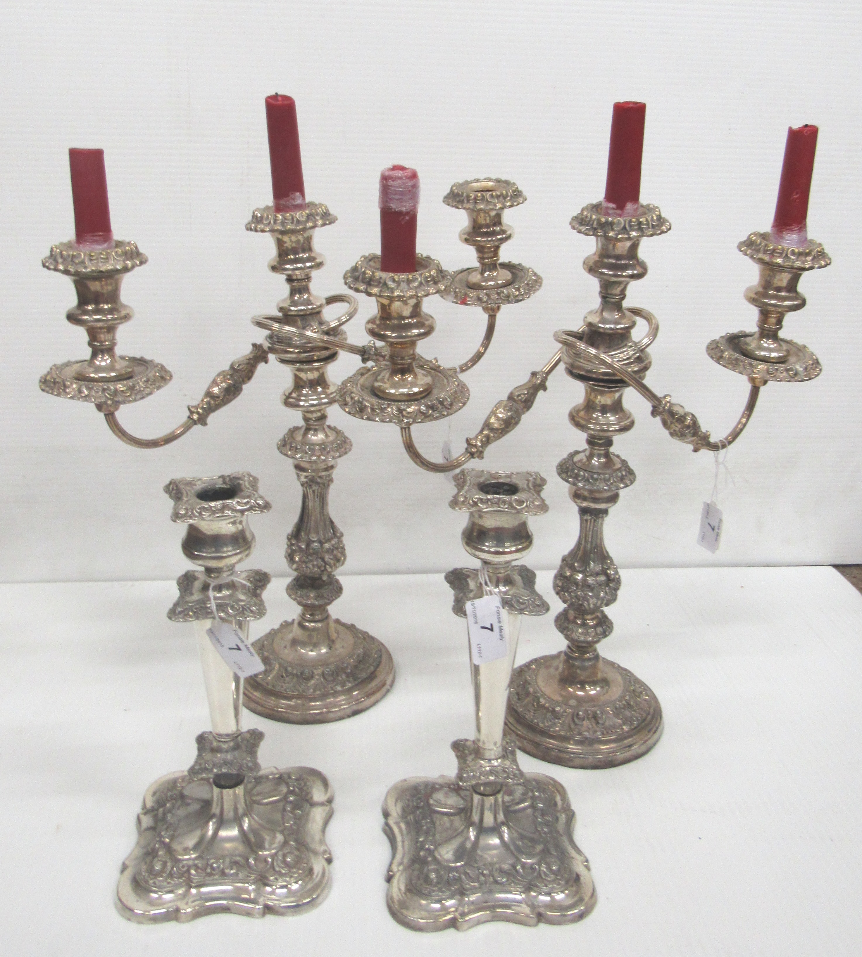 A pair of 19th Century two branch three light silver plated Candelabra,