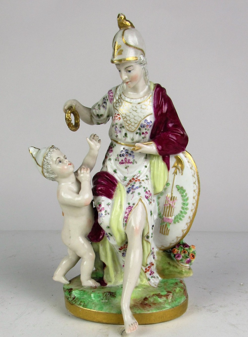A late 19th Century Meissen Group, 'Minerva & Child," 21cms (8 1/4") high.