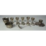 A silver Ink Well, 5 silver Egg Cups, 4 silver Napkin Rings, 2 small silver Bowls,